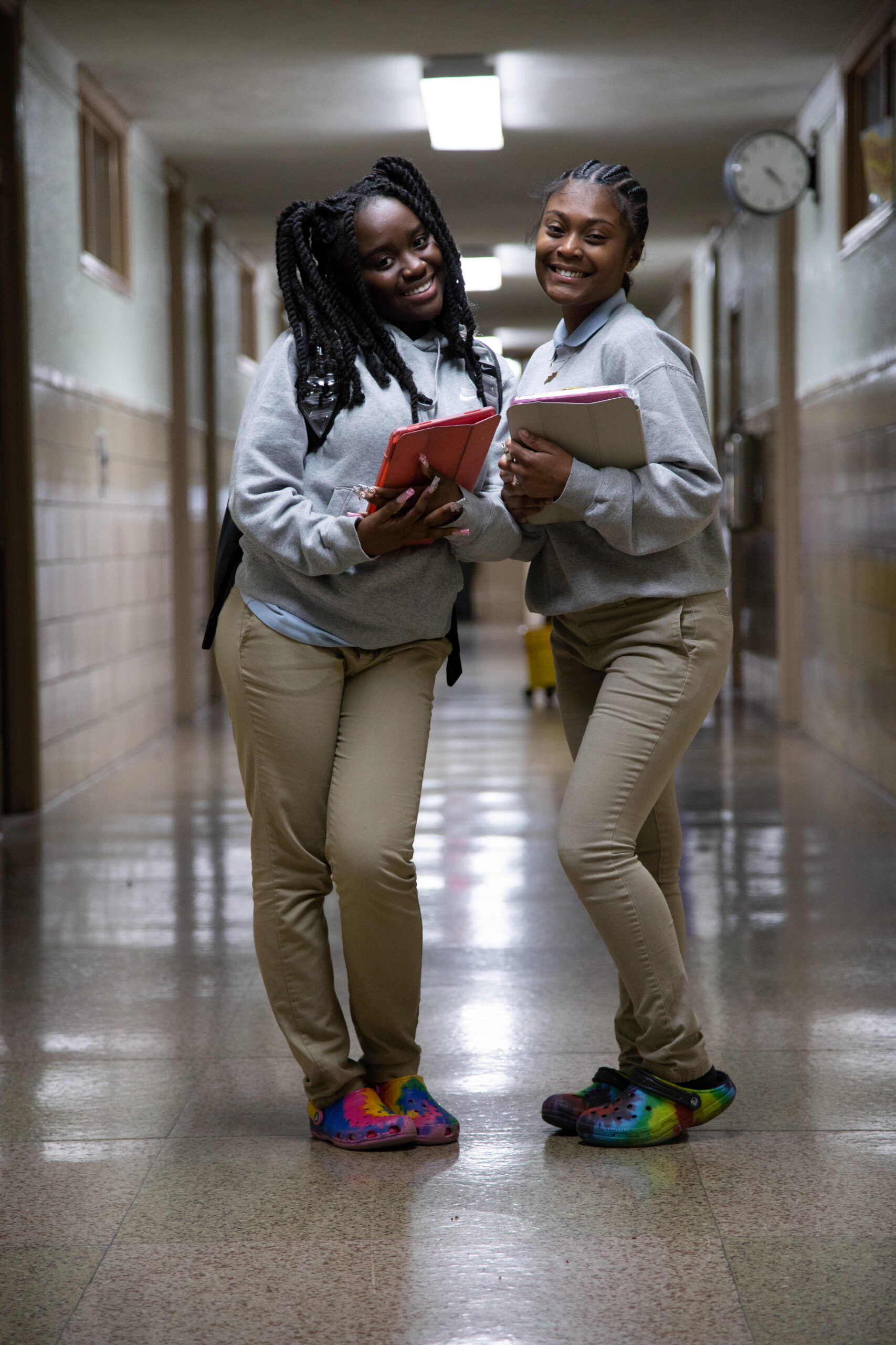 two female scholars in partner school heading to academy after school program two female scholars in partner school heading to academy after school program